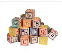 Product display of wooden alphabet blocks.
